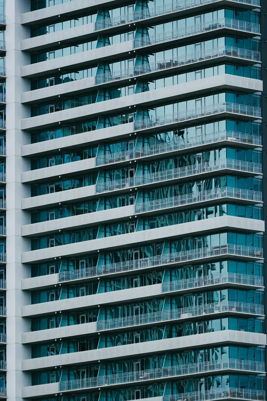 Repeating balconies and glass on a modern Austin residential tower