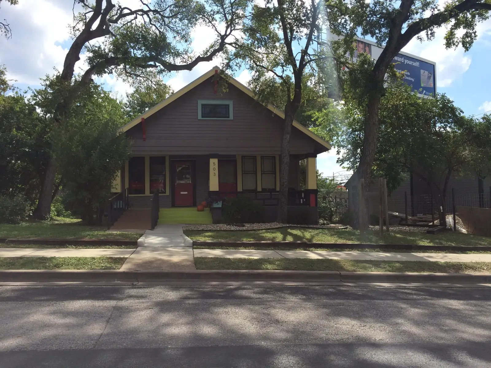 A shaded bungalow on West Lynn Street in Austin